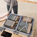 6-delt rejseorganizersæt med leopardprint