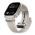 Apple Watch (42/44/SE/45/46/49mm) silikonearmbånd med lodrette striber og titanium-stik - Stjernelys