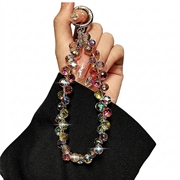 Krystalperlet håndledsrem til mobil - 14cm - ravfarvet