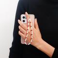 Frugtperler mobilcharme med håndledsrem - 22cm - hvid / rød