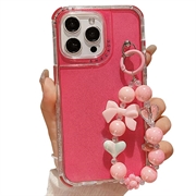 iPhone 16 Pro Glitter stødsikkert hybrid cover med håndledsrem - Hot Pink