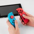 Nintendo Switch Controller silikoneetui med hætter til tommelfingergreb - rød / blå