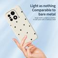 OnePlus 15 Slim TPU-cover med hjertemønster - hvid / sort