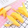 Kuorittava banan-dumpling squishy legetøj til børn og voksne - gul