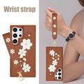Samsung Galaxy S24 Ultra Blomsterdekoration Cover med Rem - Brun