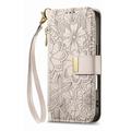 iPhone 16 Pungetui med blomster- og bladmønster med lynlåslomme og håndledsrem - hvid